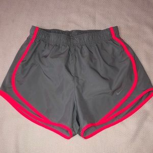 Nike dri fit small athletic shorts gray with pink stripes, built in panty